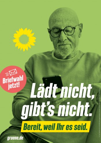 Wahlplakat Bündnis 90/Die Grünen. älterer Mann mit Handy. Text: Lädt nicht, gibt's nicht.